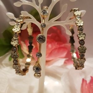 3 Cream colored & gold tone bangle bracelets